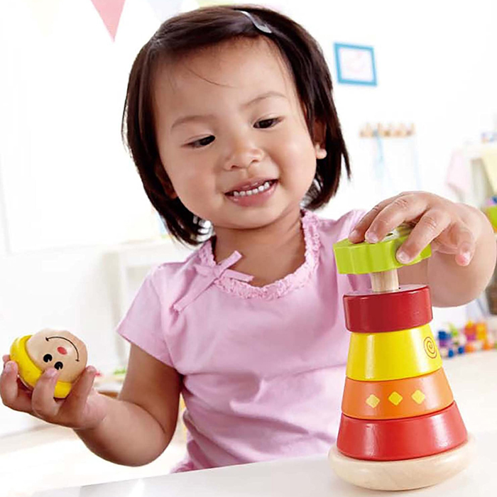 little girl building tower - Image 4